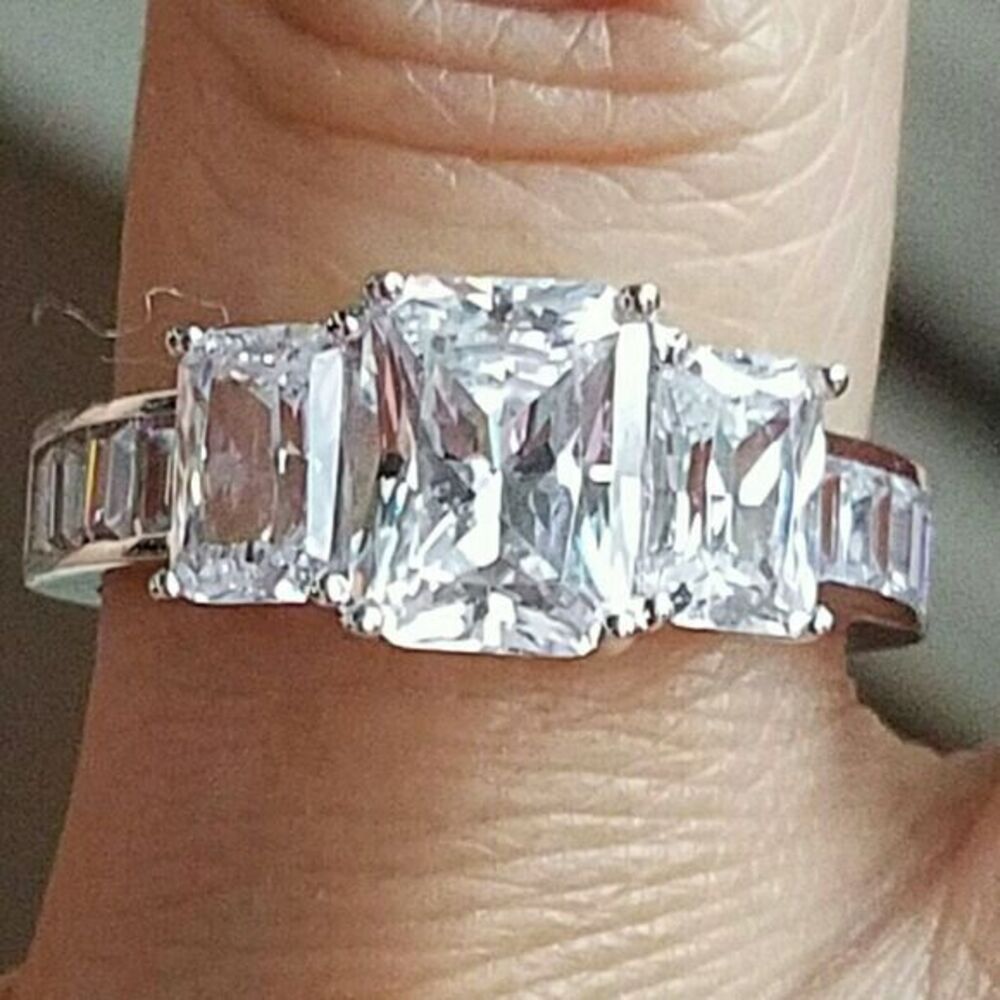 14k Three stone Emerald cut Engagement ring size 7